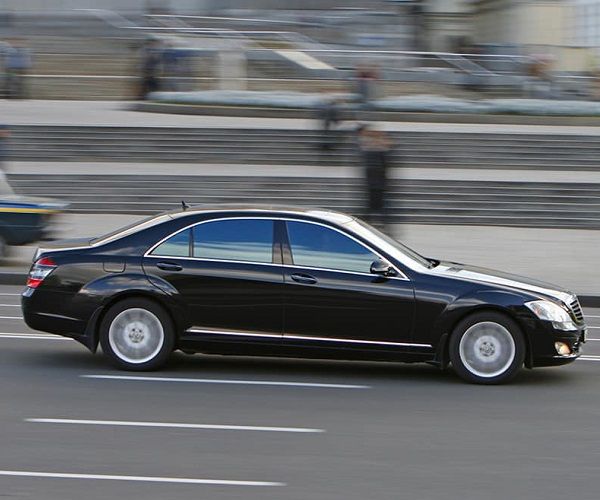 chauffeur service in berlin, high car in the street.